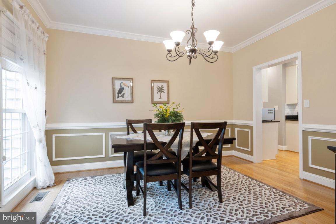 9717 Rugby Court Ellicott City, MD 21042 - Photo 7 of 59 Elegant dining room w/chair rail and mouldings