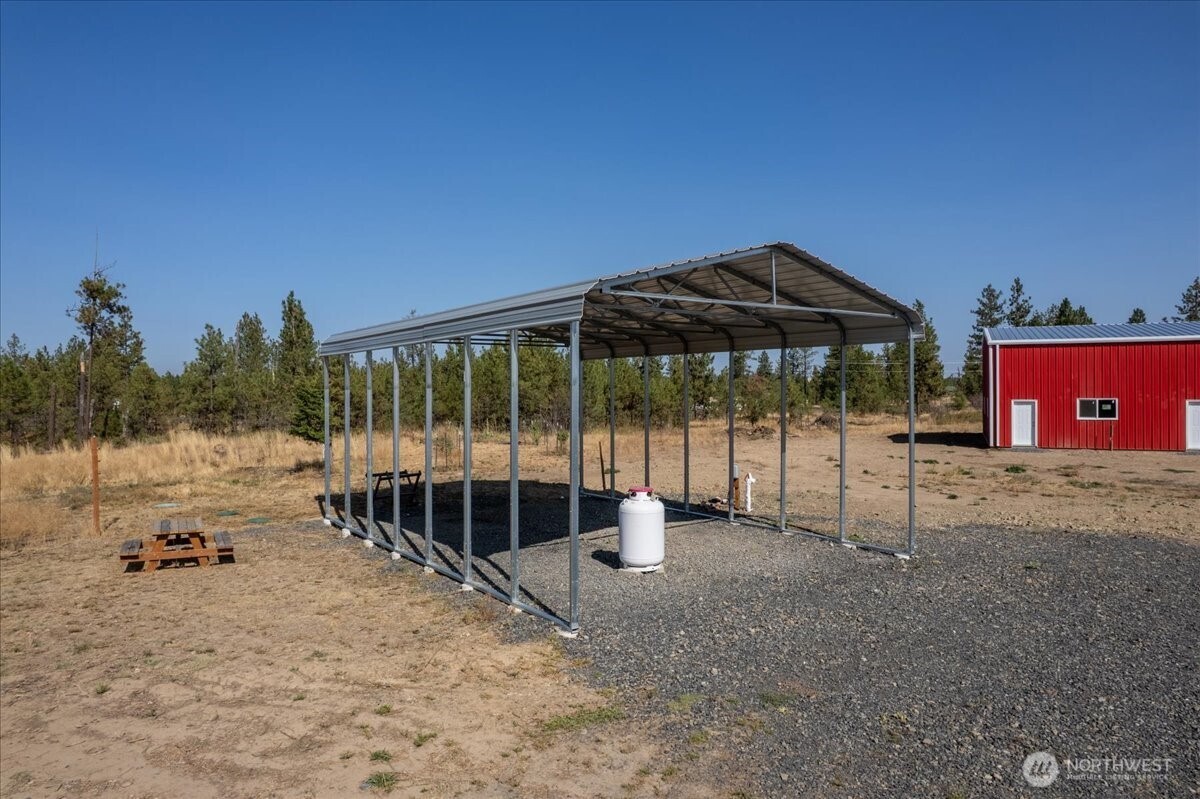 35000 Miles Creston Road North Creston, WA 99117 - Photo 13 of 26 a view of a house with a backyard
