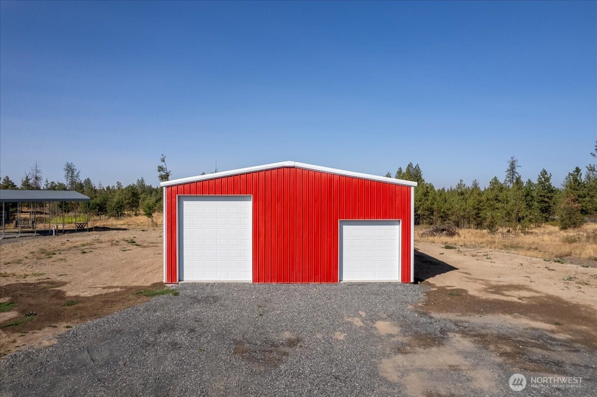 35000 Miles Creston Road North Creston, WA 99117 - Photo 8 of 26 a view of a wooden space with a road
