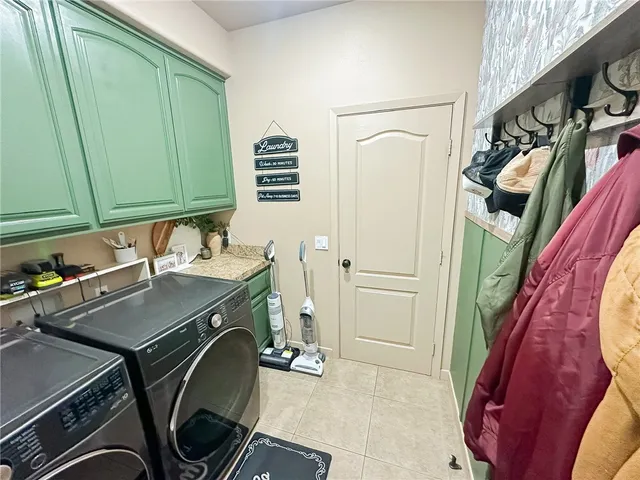 a storage room with washer and dryer
