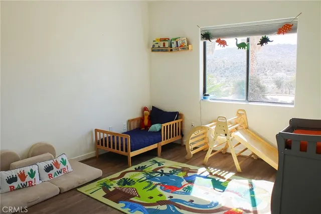 a room with toys and a window