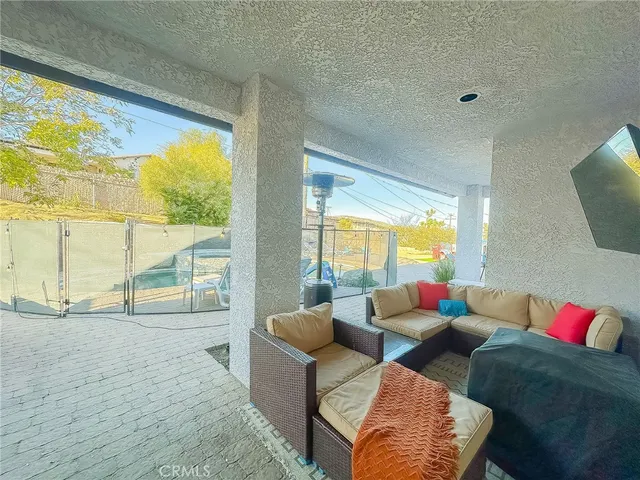 a living room with furniture and a table