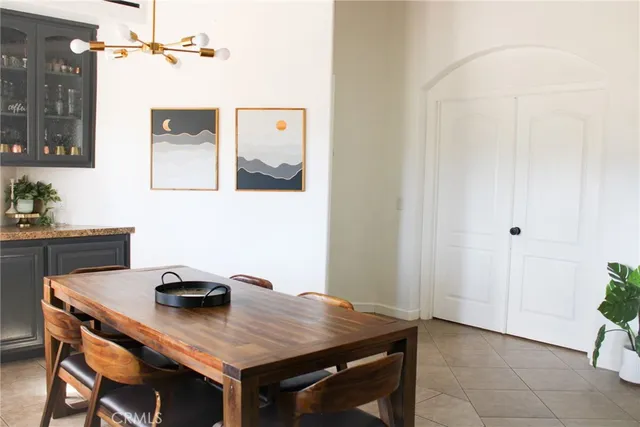 a view of a workspace area with furniture