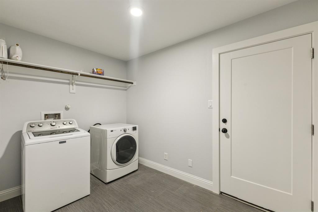 12345 Band Dallas, TX 75244 - Photo 16 of 38 a utility room with dryer and washer