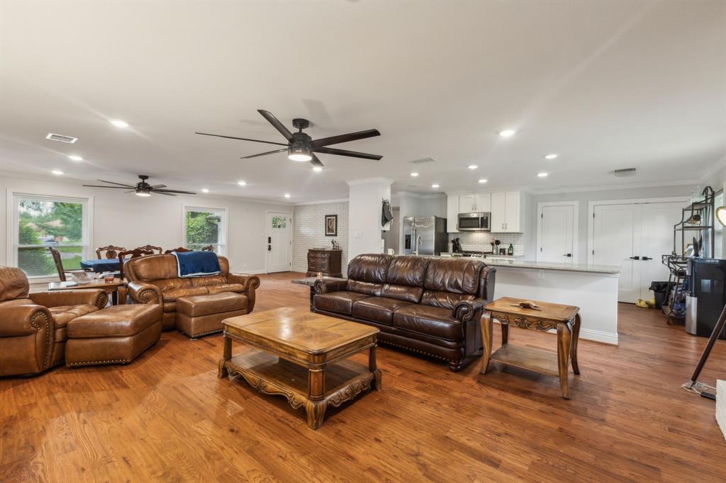 12345 Band Dallas, TX 75244 - Photo 25 of 38 a living room with furniture and a wooden floor