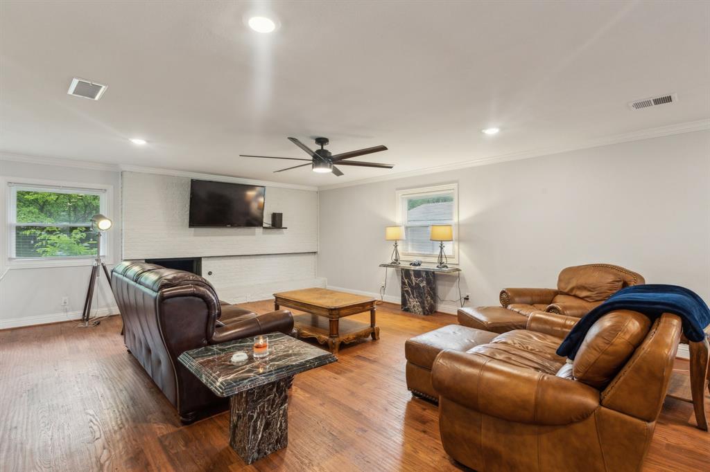 12345 Band Dallas, TX 75244 - Photo 29 of 38 a living room with furniture a ceiling fan and a window