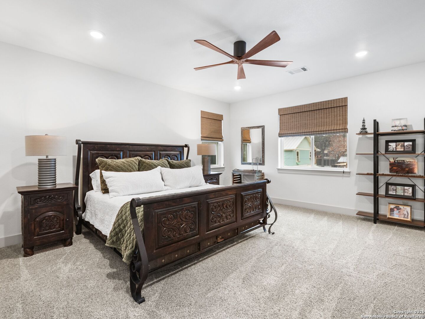 603 Graham Street Boerne, TX 78006 - Photo 27 of 42 a bed room with a bed and a window