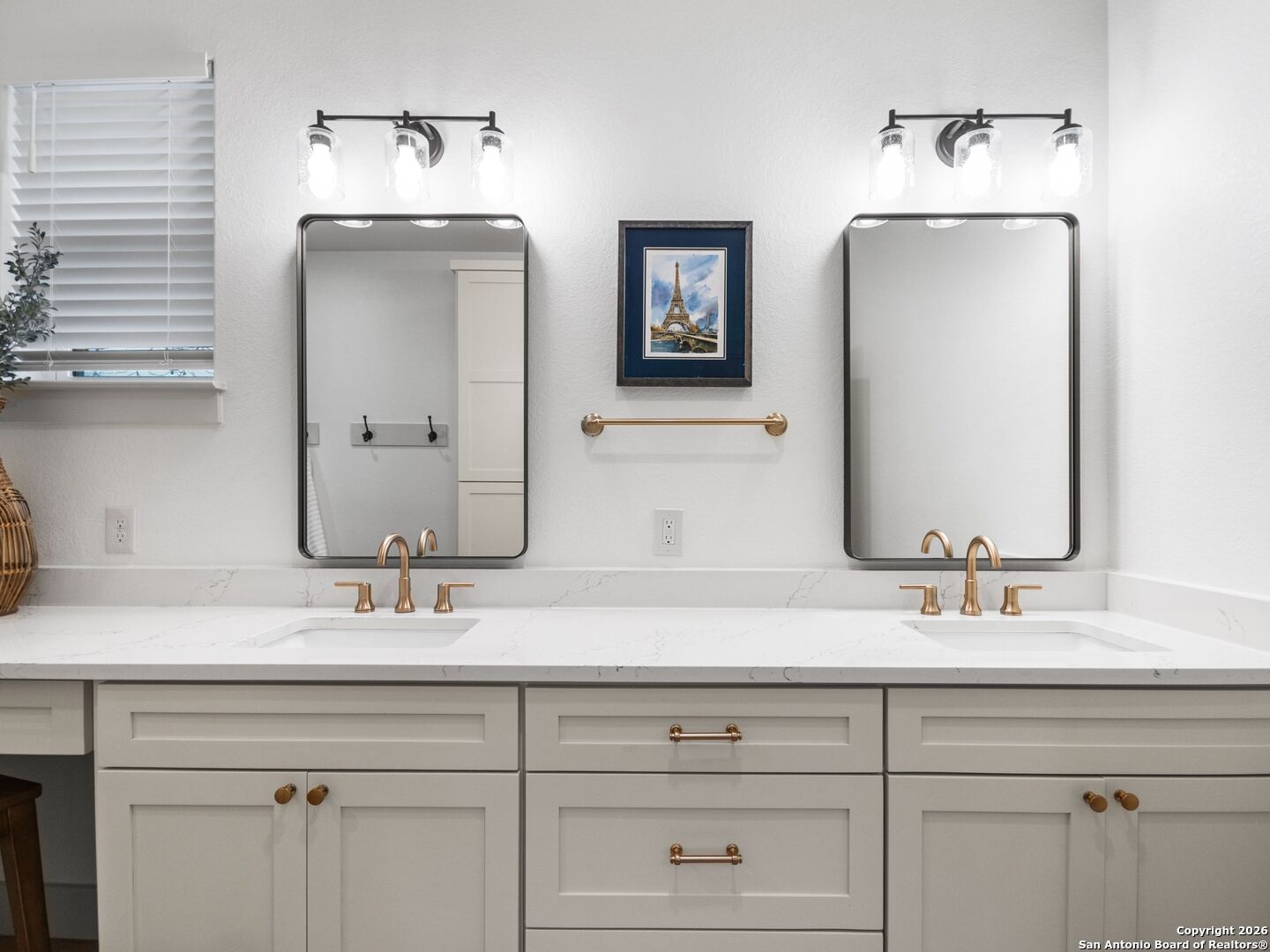 603 Graham Street Boerne, TX 78006 - Photo 28 of 42 a bathroom with double vanity sinks and two mirror