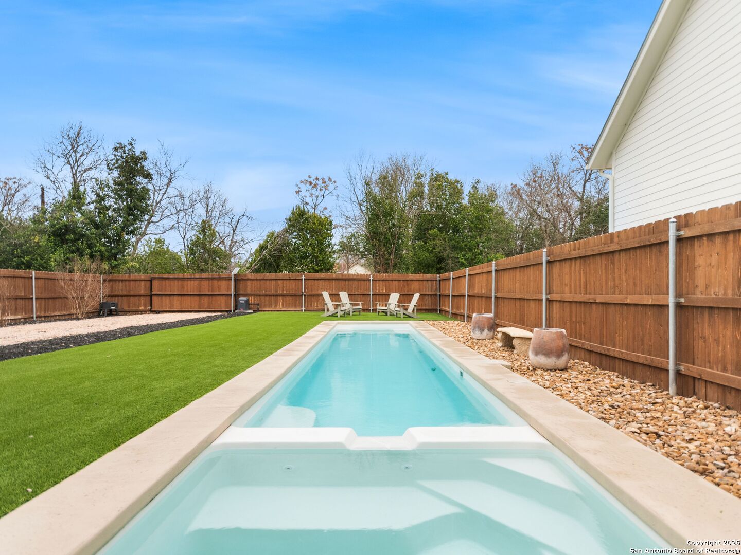 603 Graham Street Boerne, TX 78006 - Photo 35 of 42 a view of a backyard with a swimming pool