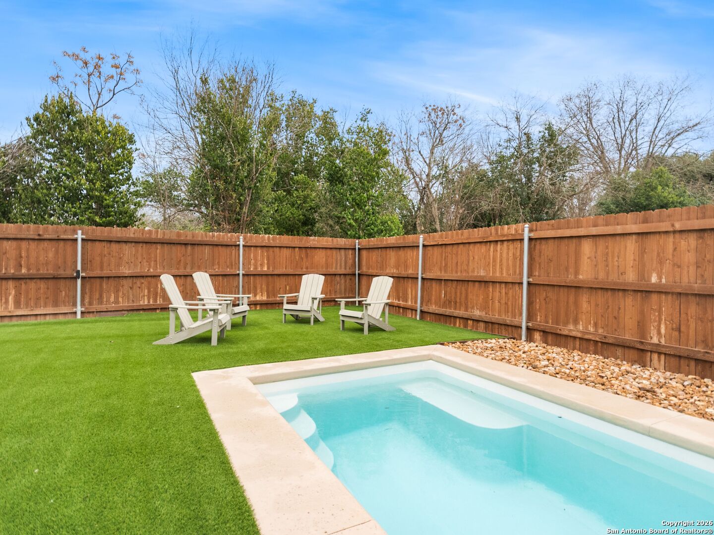 603 Graham Street Boerne, TX 78006 - Photo 36 of 42 a view of a backyard with sitting area