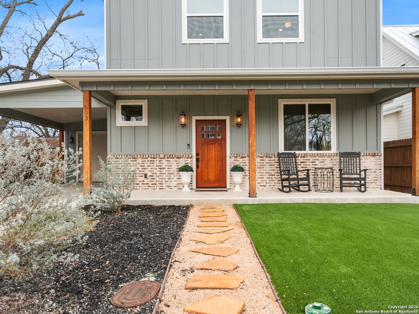603 Graham Street Boerne, TX 78006 - Photo 10 of 42 a front view of a house with a yard