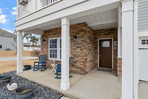 a room with a table and chairs
