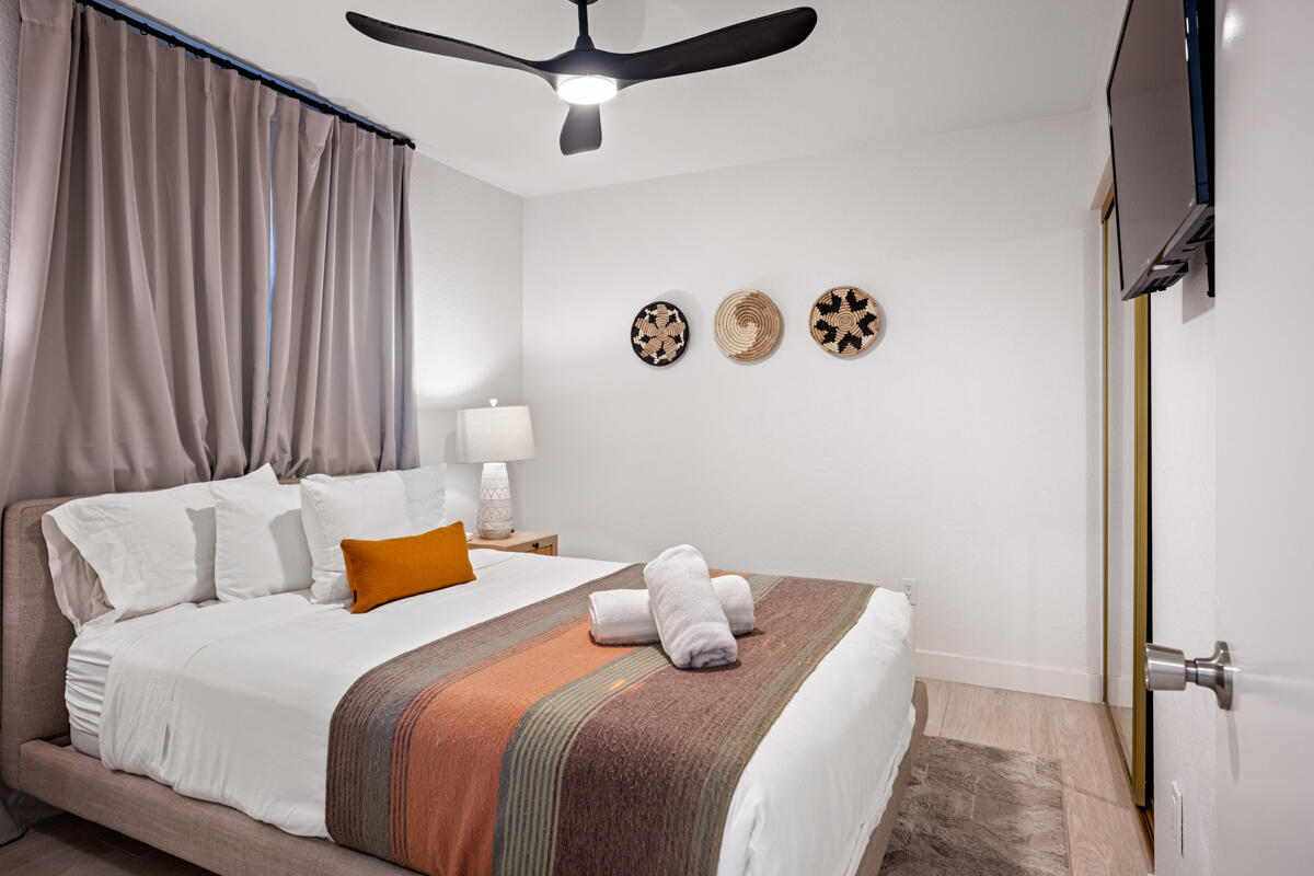 45640 Cimarron Road Indio, CA 92201 - Photo 14 of 28 a bedroom with a bed and a table