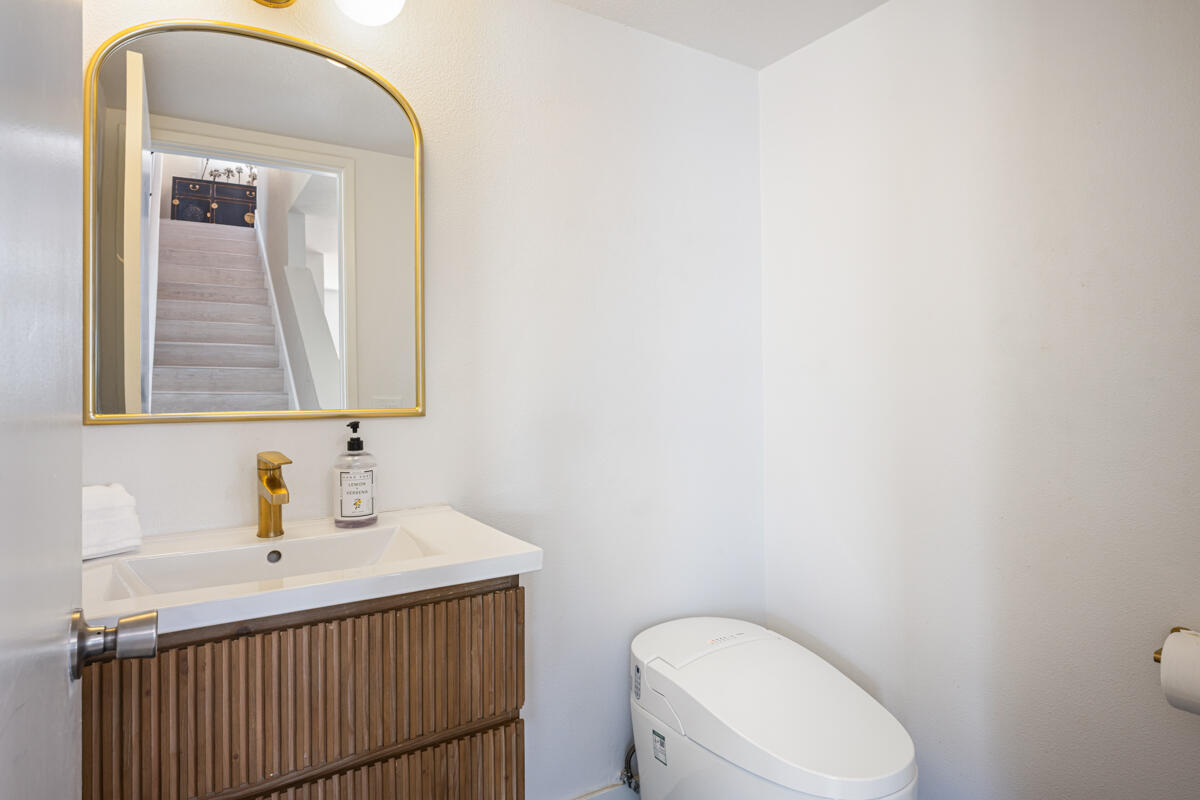 45640 Cimarron Road Indio, CA 92201 - Photo 20 of 28 a bathroom with a toilet sink and mirror