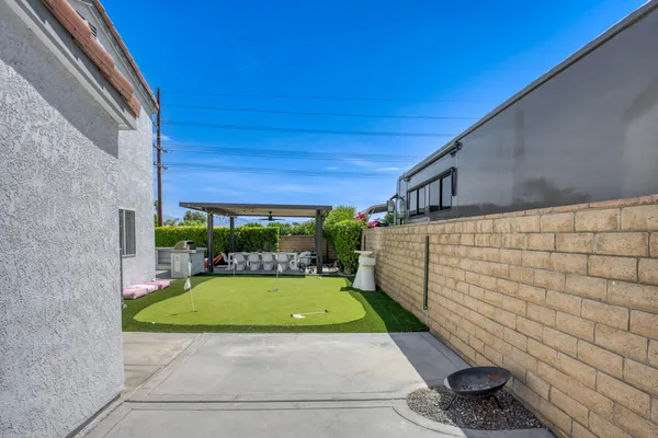 a view of a backyard with a garden
