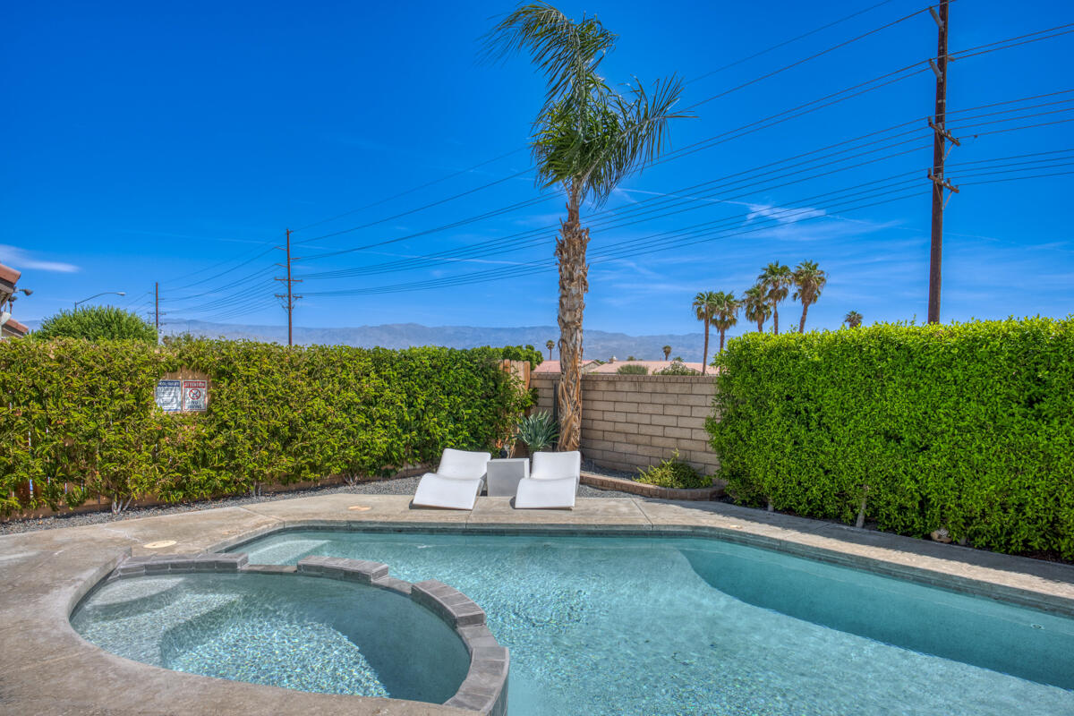 45640 Cimarron Road Indio, CA 92201 - Photo 26 of 28 a view of a outdoor space with a house in the background
