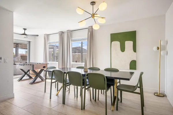 a view of a dining room with furniture window and outside view