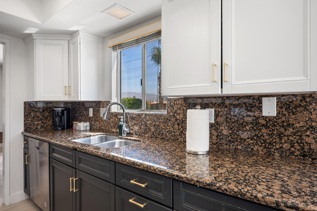 45640 Cimarron Road Indio, CA 92201 - Photo 8 of 28 a bathroom with a sink and a mirror