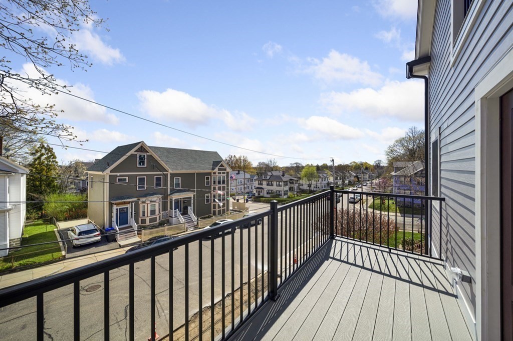 9 Whitford Street, Unit 9 Boston, MA 02131 - Photo 21 of 25 a view of city from a balcony