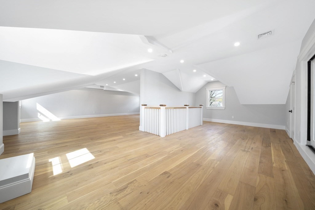 9 Whitford Street, Unit 9 Boston, MA 02131 - Photo 24 of 25 a view of empty room with wooden floor