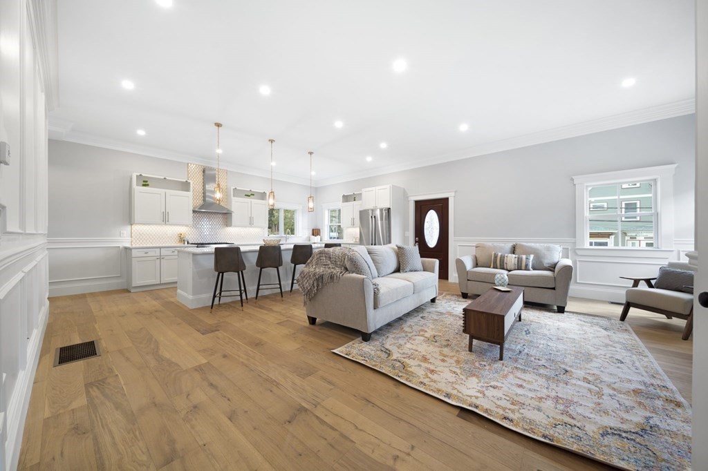 9 Whitford Street, Unit 9 Boston, MA 02131 - Photo 6 of 25 a living room with furniture and view of kitchen