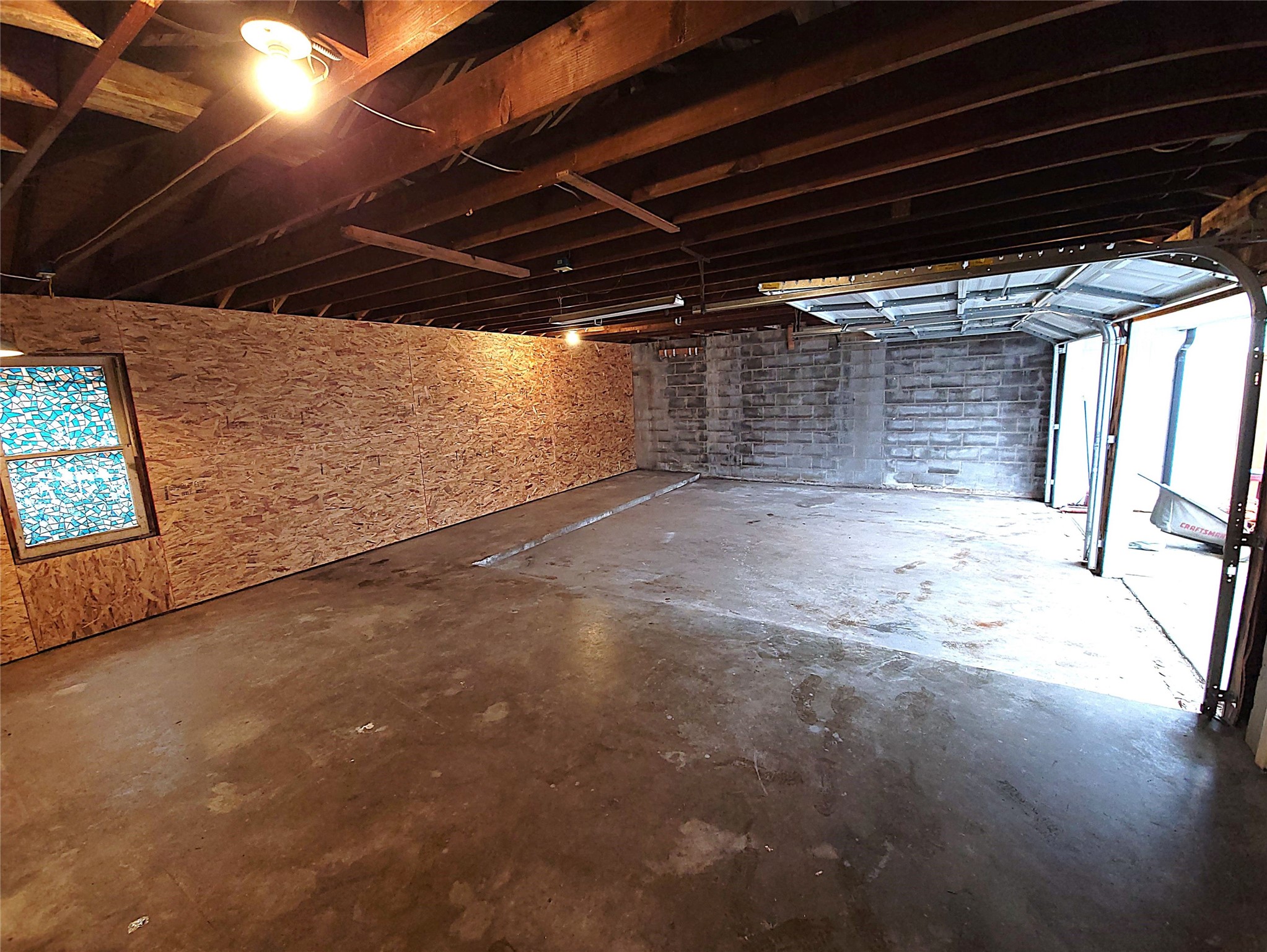 628 King Street Houston, TX 77022 - Photo 6 of 24 Plenty of flexibility for use as workbench area or man cave to watch sports.