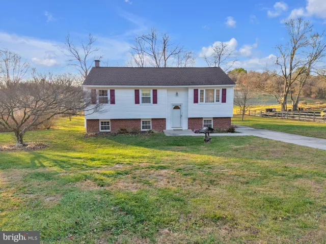 a view of a house with a big yard