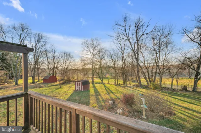 a view of swimming pool with seating space