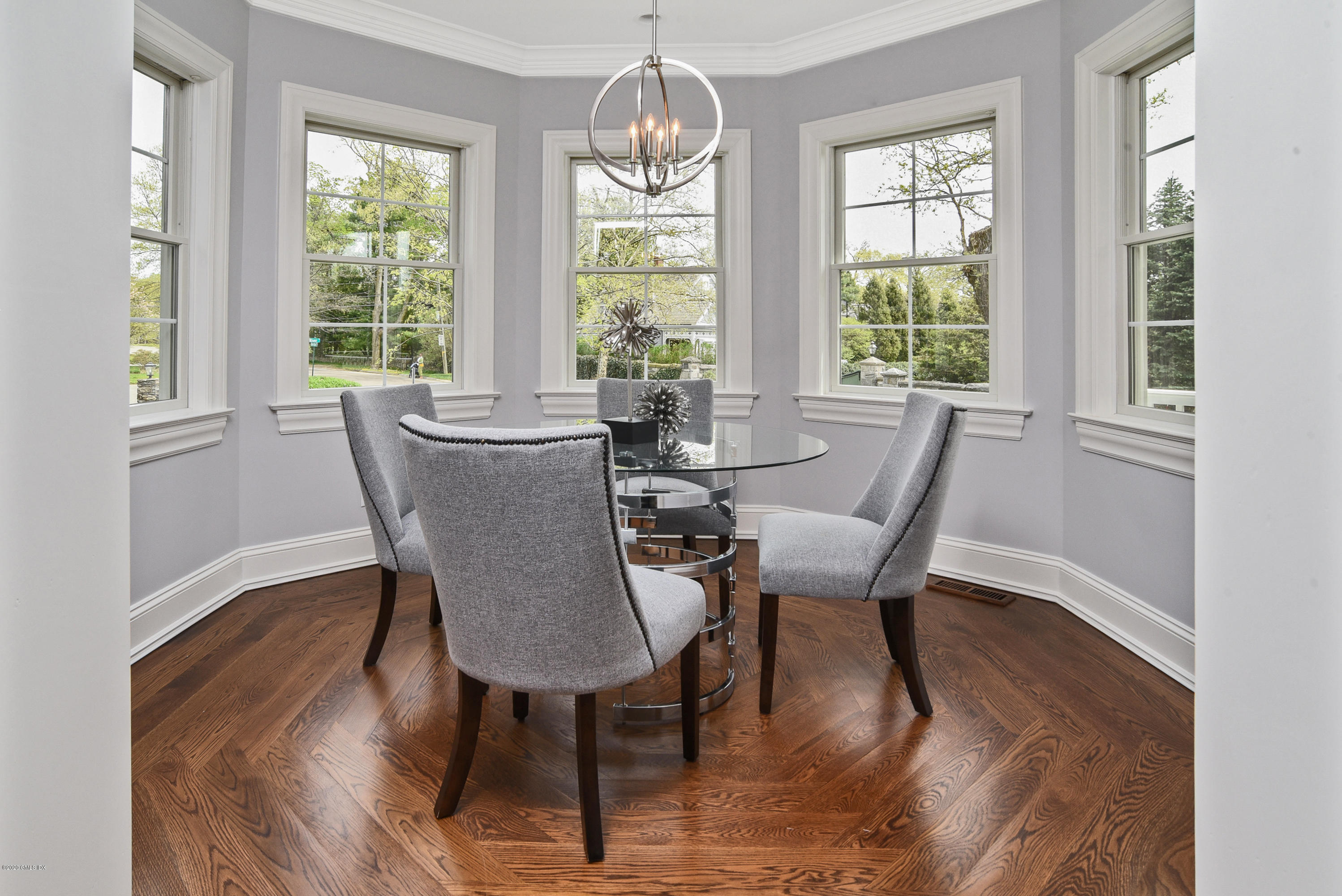 154 Byram Shore Road Greenwich, CT 06830 - Photo 11 of 37 a view of a dining room with furniture window and outside view