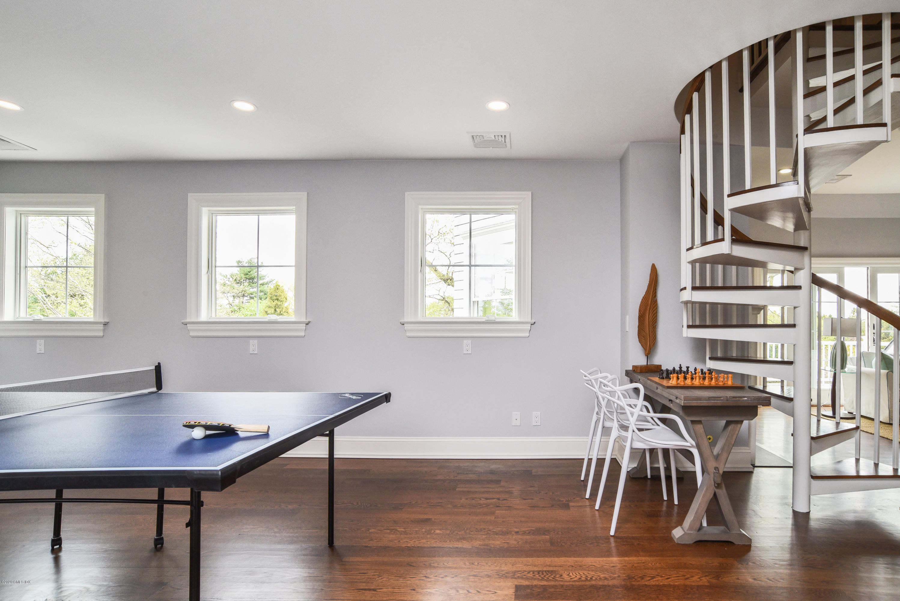 154 Byram Shore Road Greenwich, CT 06830 - Photo 22 of 37 a workspace with furniture and wooden floor