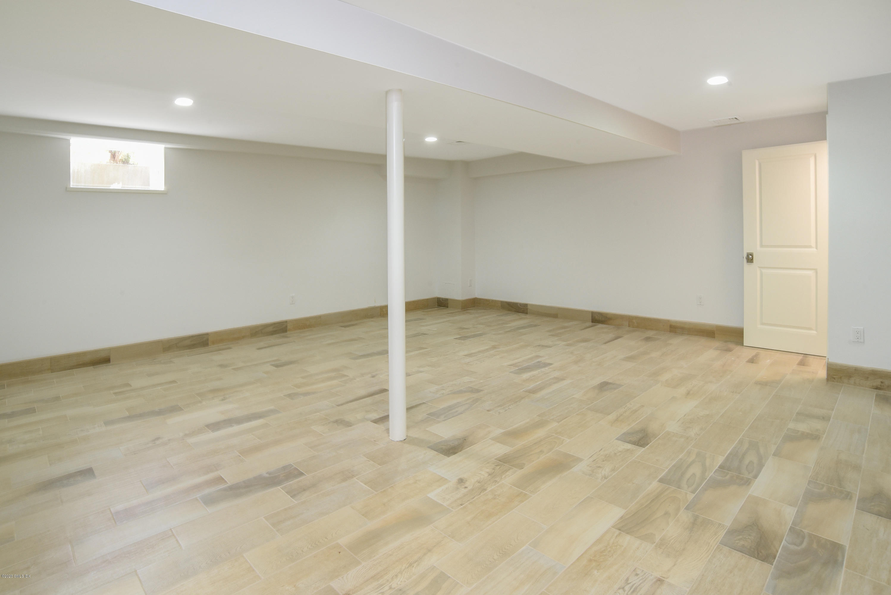 154 Byram Shore Road Greenwich, CT 06830 - Photo 28 of 37 an empty room with an entryway