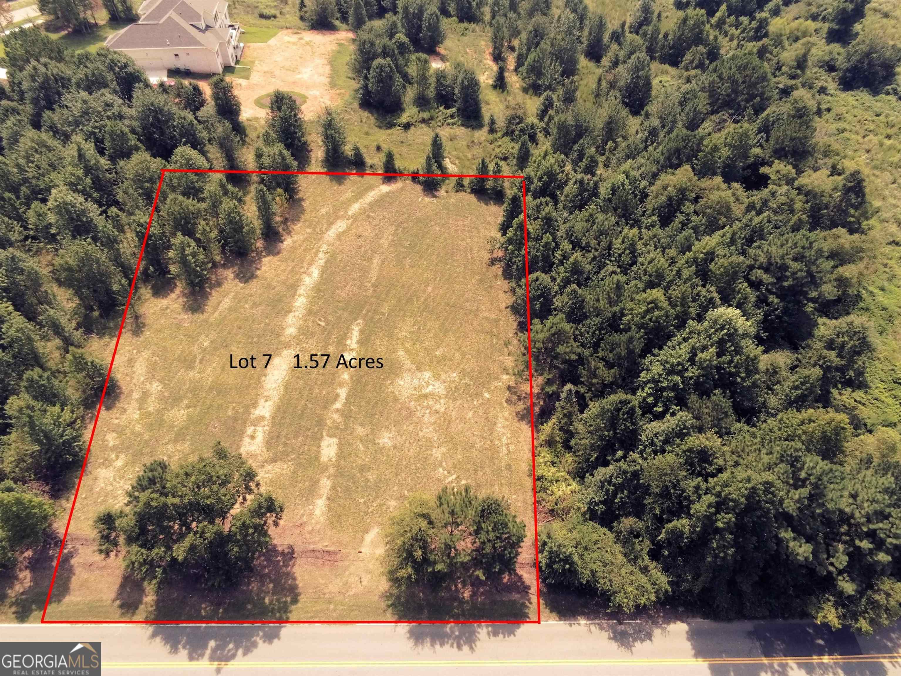 7506 Rivertown Road Fairburn, GA 30213 - Photo 1 of 13 a view of outdoor space and yard