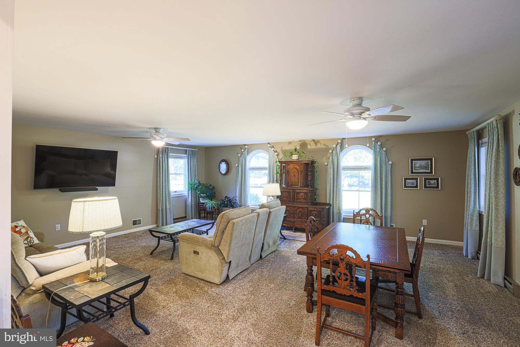 8425 Bussenius Road Pasadena, MD 21122 - Photo 15 of 33 Family room showing both