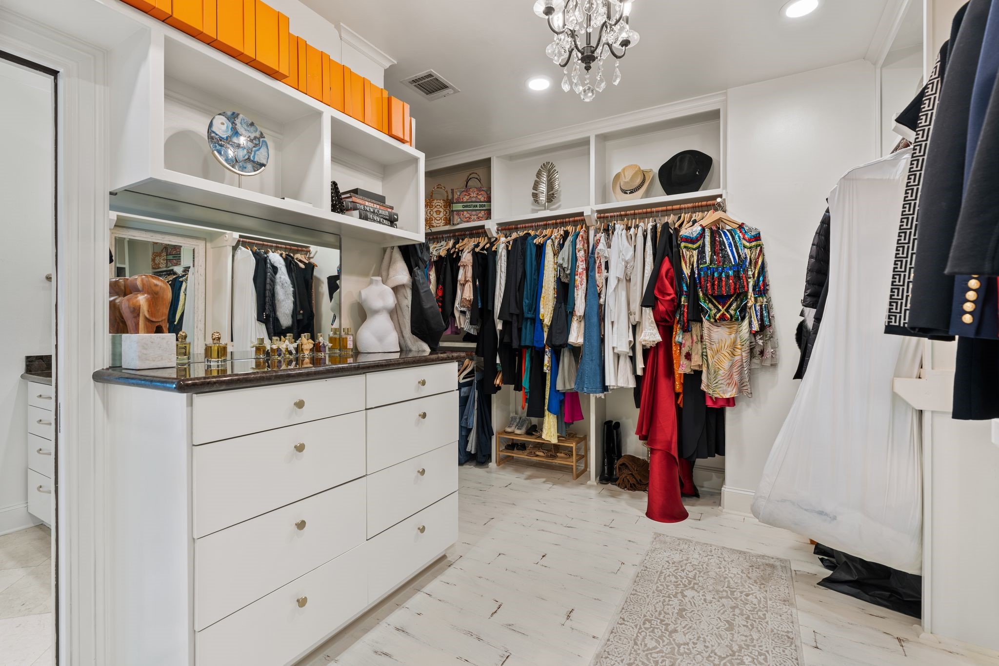30 Hackberry Lane, Unit A Houston, TX 77027 - Photo 28 of 42 Primary closet with custom built-ins.