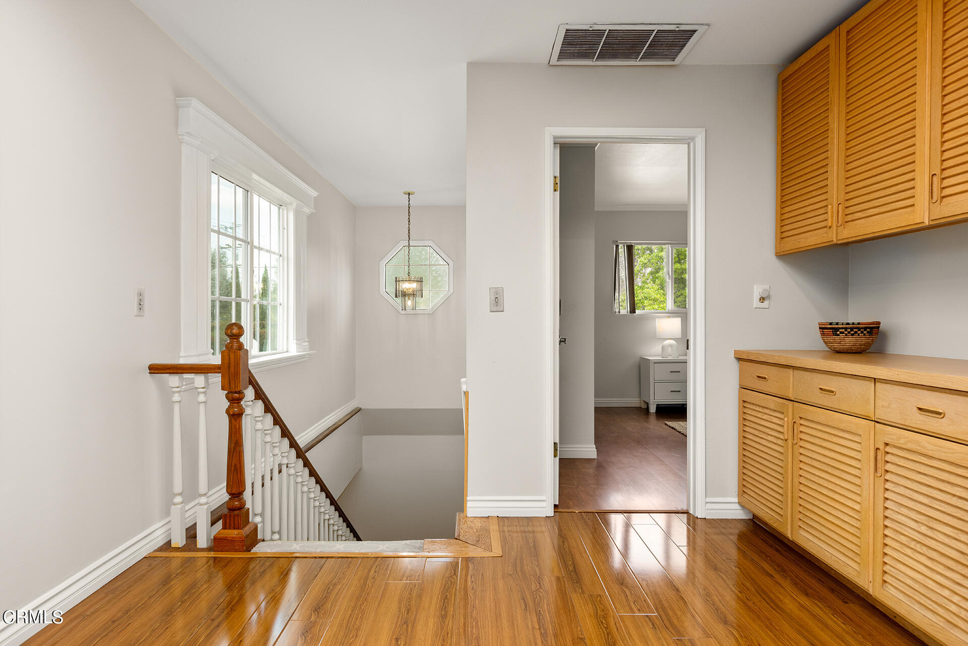 8601 Duarte Road San Gabriel, CA 91775 - Photo 15 of 26 a view of a hallway with wooden floor and staircase