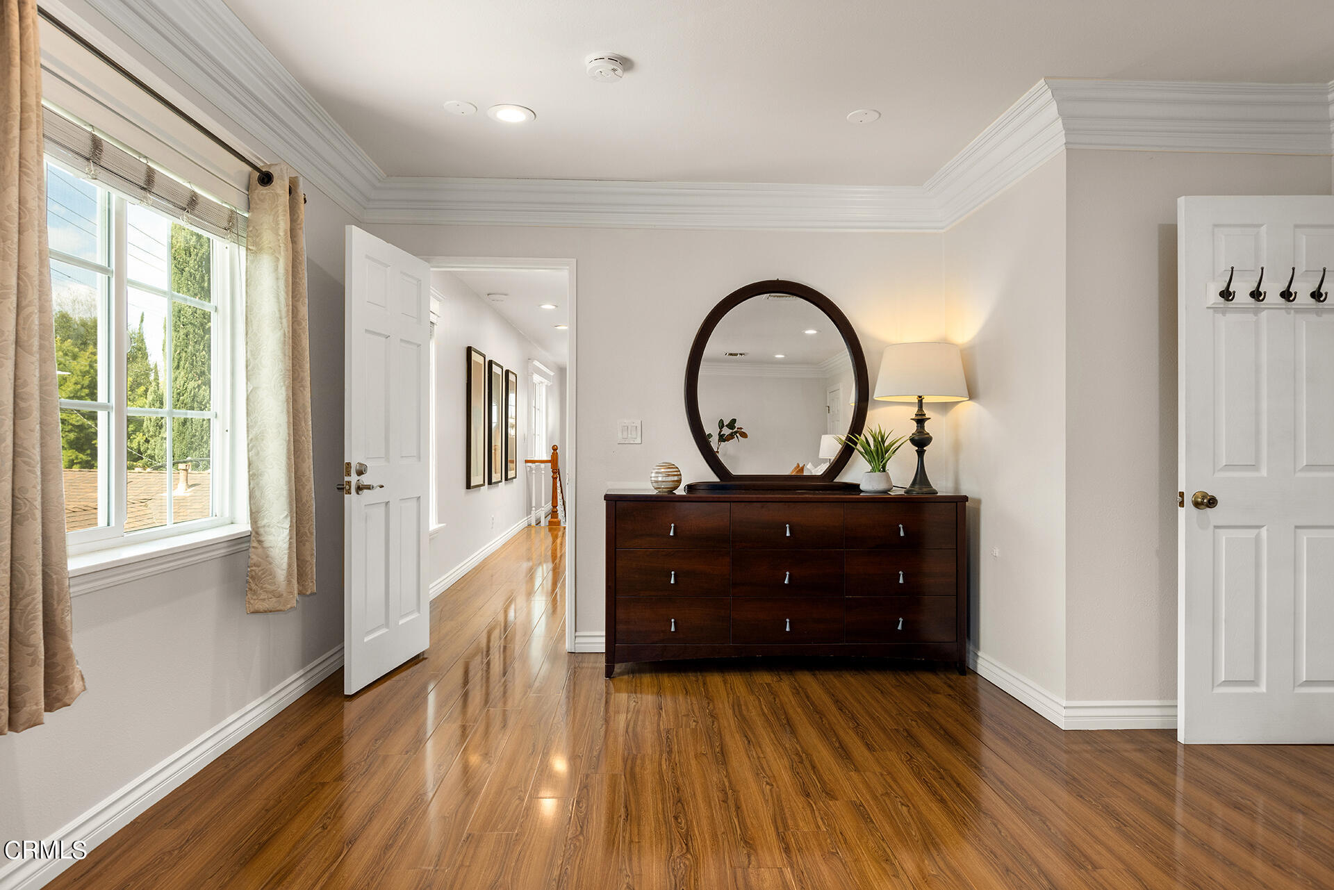 8601 Duarte Road San Gabriel, CA 91775 - Photo 17 of 26 a living room with a couch and a dresser next to a window