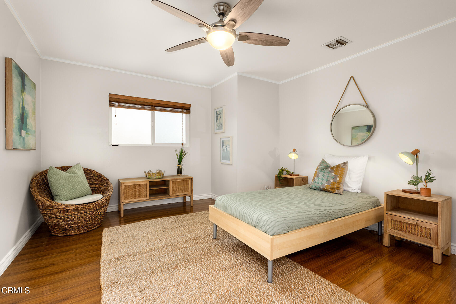 8601 Duarte Road San Gabriel, CA 91775 - Photo 23 of 26 a bedroom with a bed and dresser with wooden floor