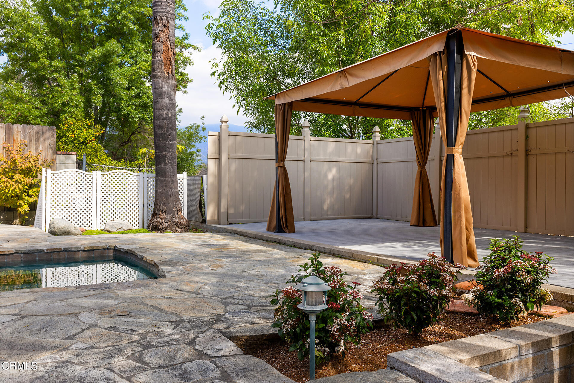 8601 Duarte Road San Gabriel, CA 91775 - Photo 25 of 26 a backyard of a house with table and chairs