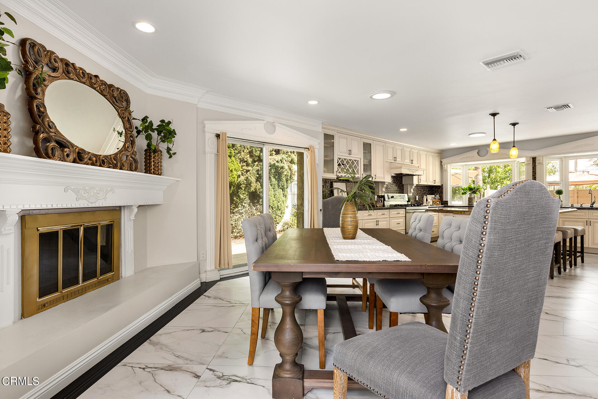 8601 Duarte Road San Gabriel, CA 91775 - Photo 6 of 26 a view of a dining room with furniture and a fireplace