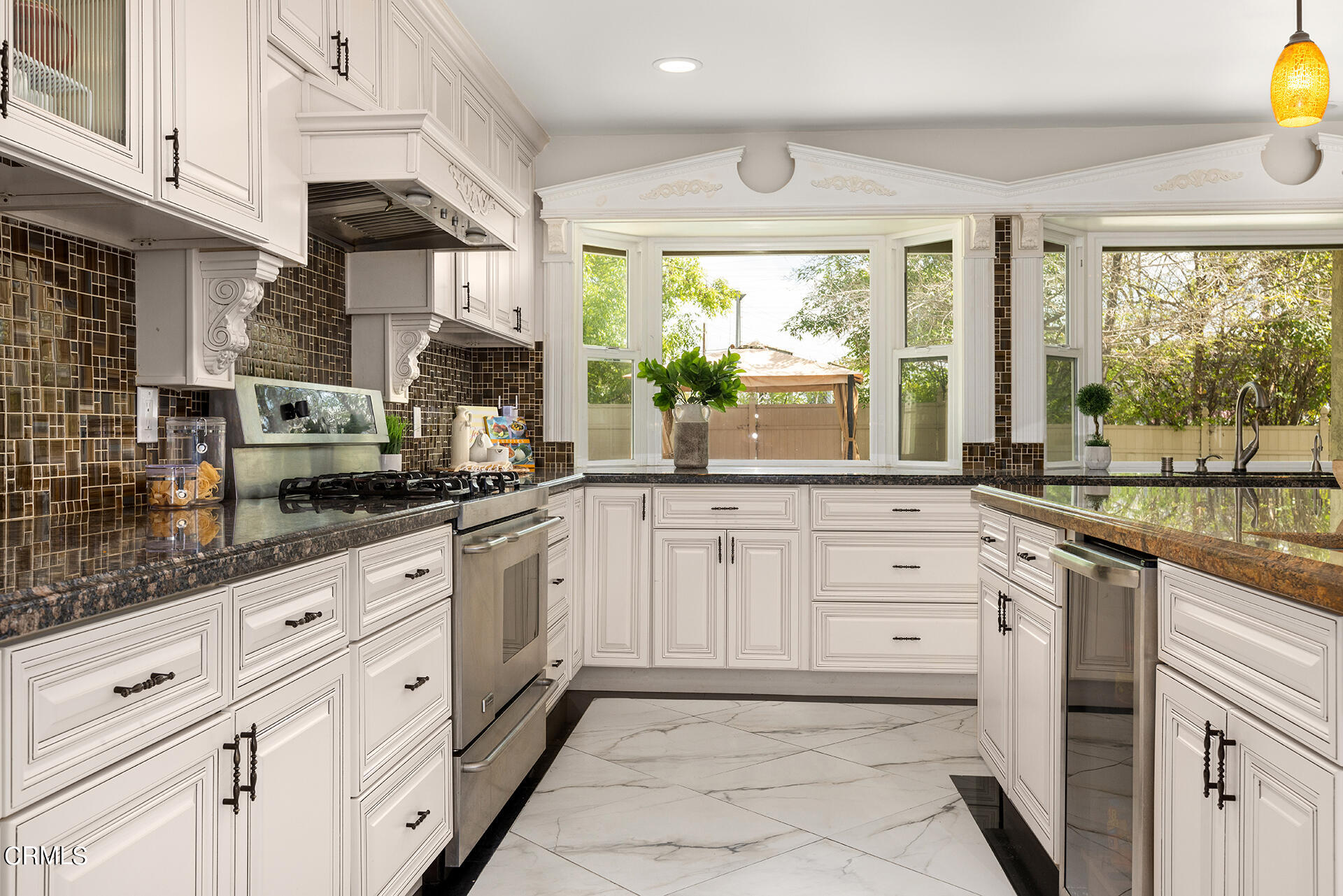 8601 Duarte Road San Gabriel, CA 91775 - Photo 8 of 26 a kitchen with granite countertop white cabinets white appliances a sink and a large window