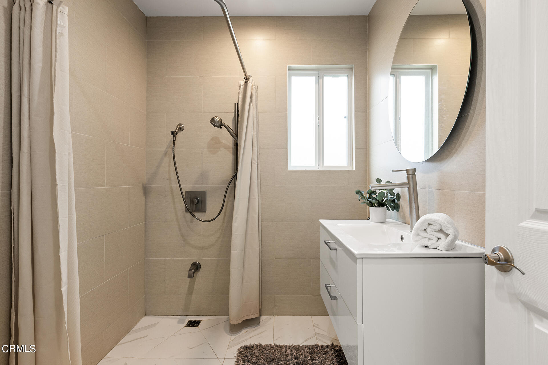8601 Duarte Road San Gabriel, CA 91775 - Photo 10 of 26 a bathroom with a sink vanity and a mirror