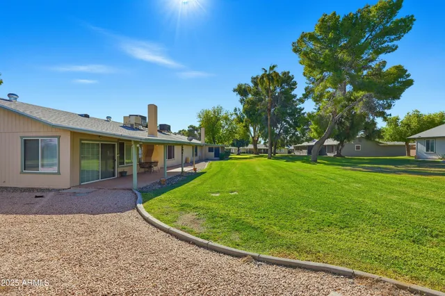 an aerial view of a city with streets and houses