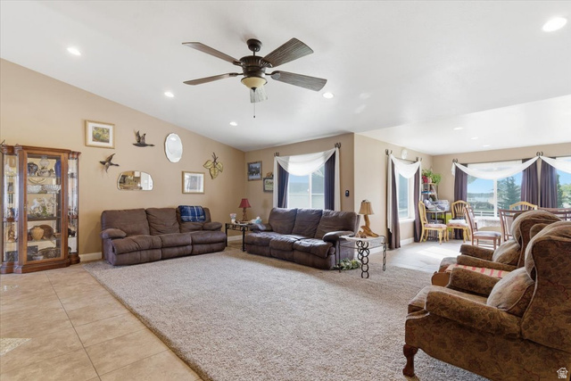 6237 West 4600th Street South Hooper, UT 84315 - Photo 9 of 48 Living room with light tile patterned floors, ceiling fan, healthy amount of natural light, and recessed lighting