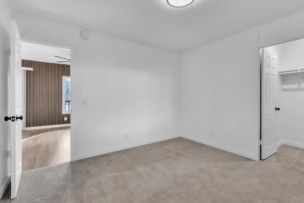 an empty room with a hallway