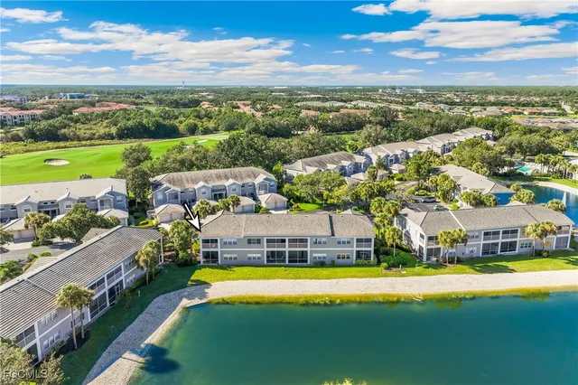 a view of a city with lawn chairs