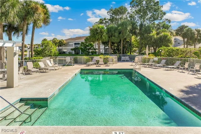 a view of a patio with swimming pool