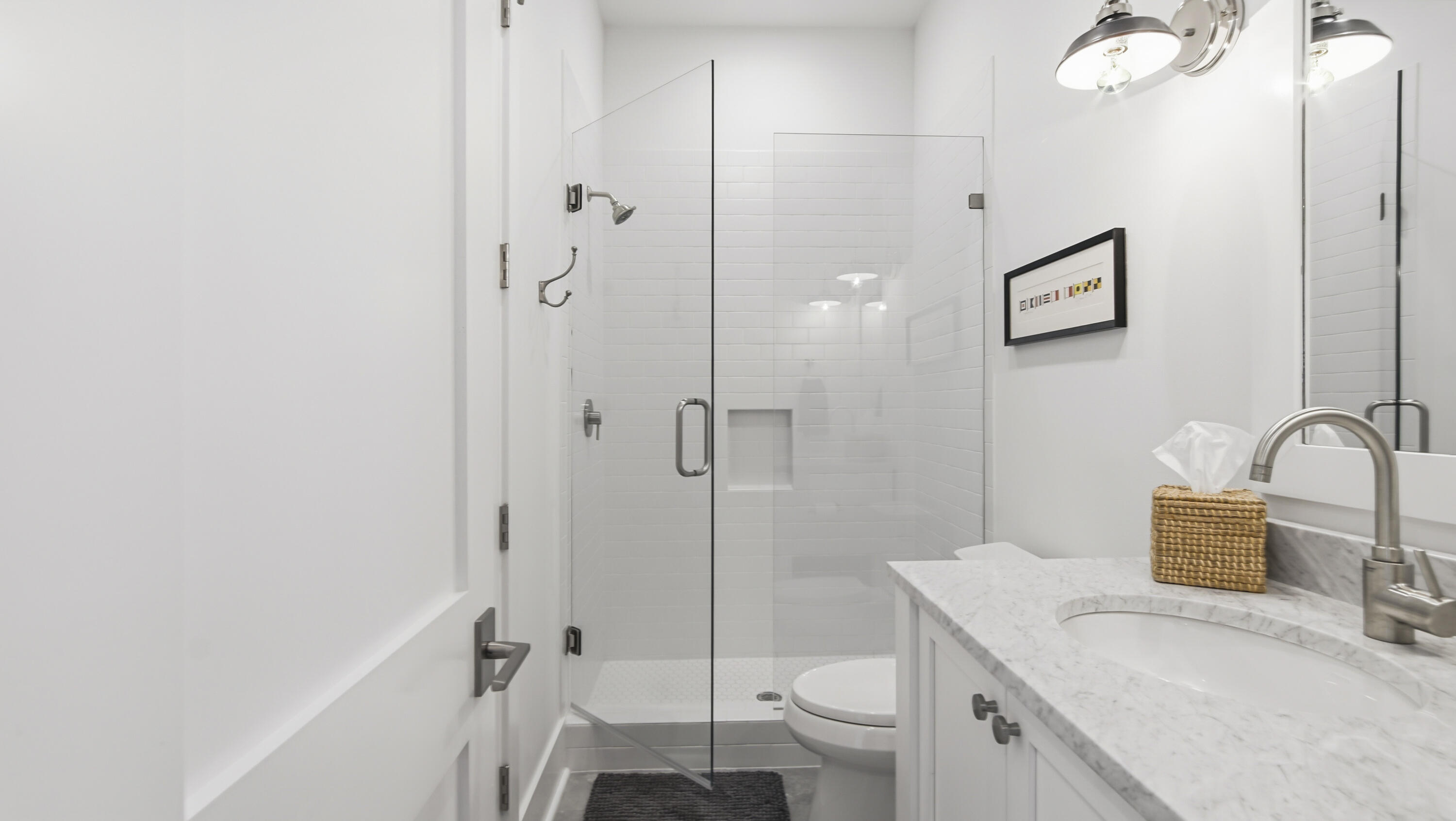 34 Heartwood Street Watersound, FL 32461 - Photo 24 of 42 a bathroom with a granite countertop sink toilet and shower