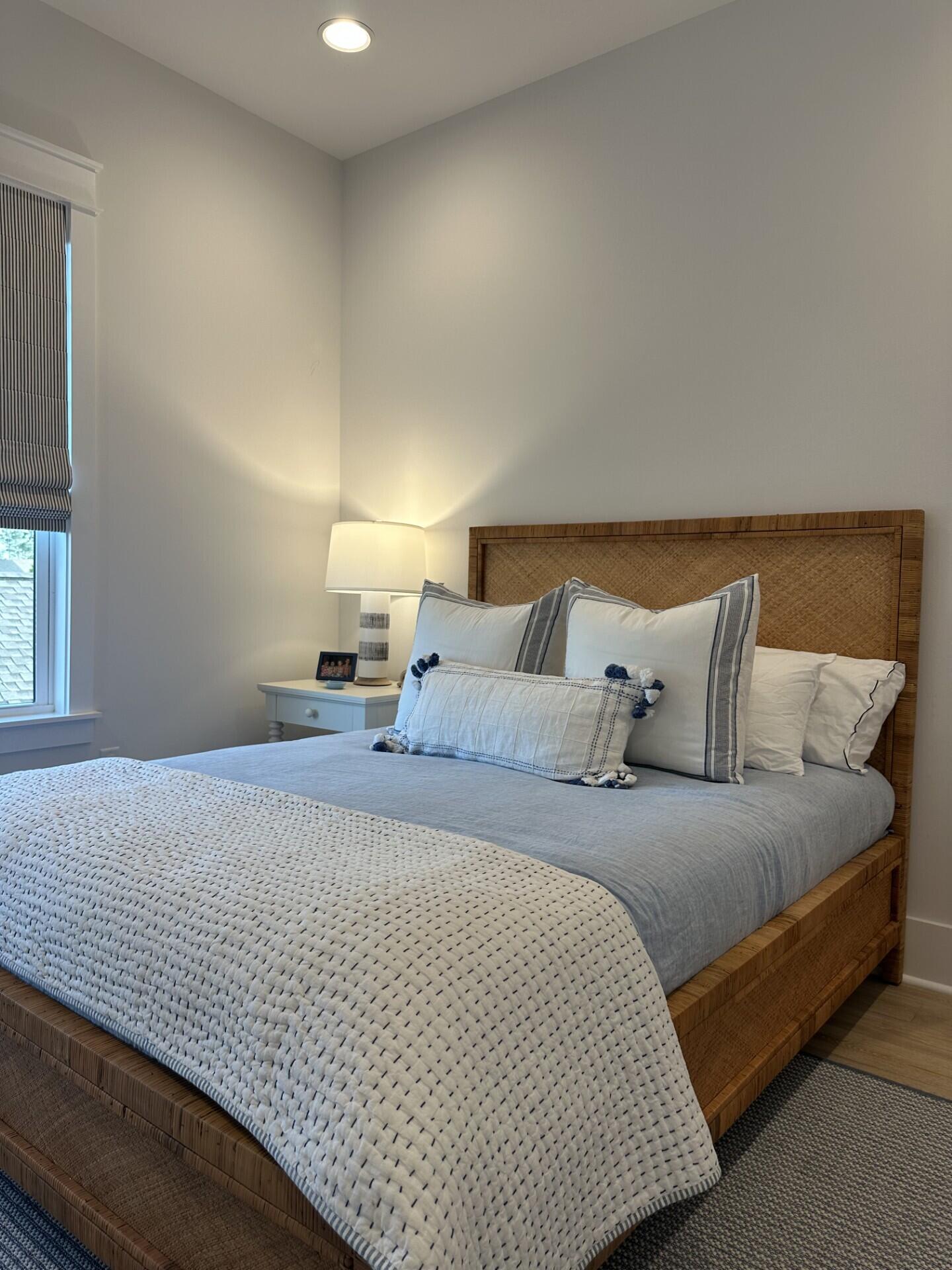 34 Heartwood Street Watersound, FL 32461 - Photo 25 of 42 a bedroom with a bed and window