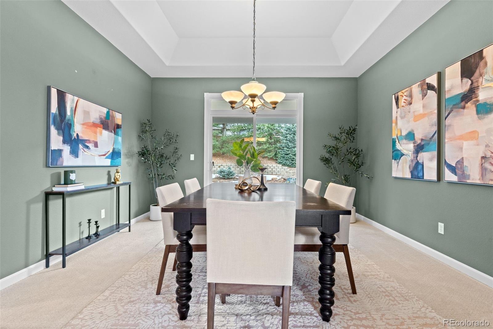 10683 Amesbury Way Highlands Ranch, CO 80126 - Photo 11 of 44 a dining room with furniture and window