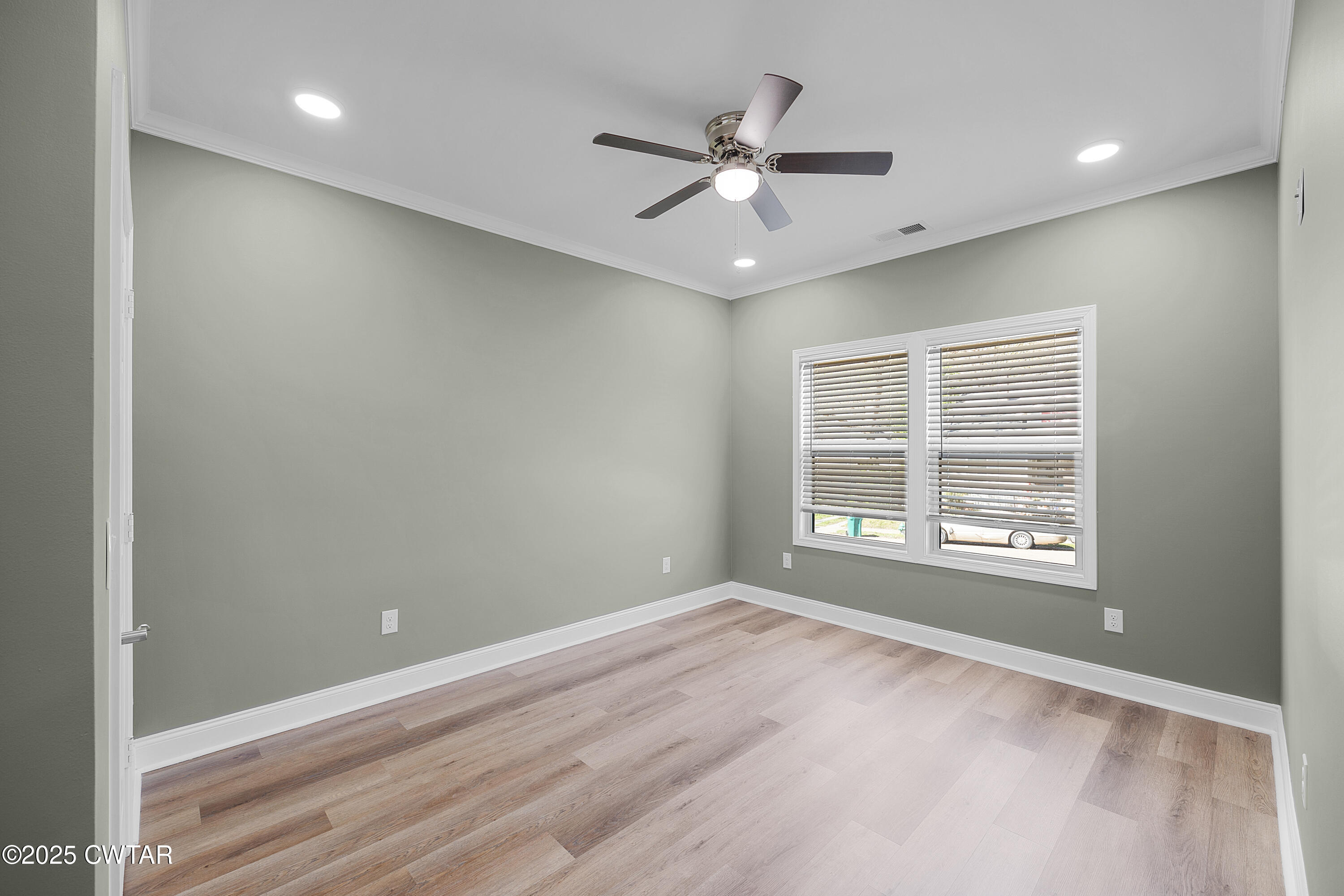 300 West Deaderick Street Jackson, TN 38301 - Photo 15 of 16 a view of an empty room with a window